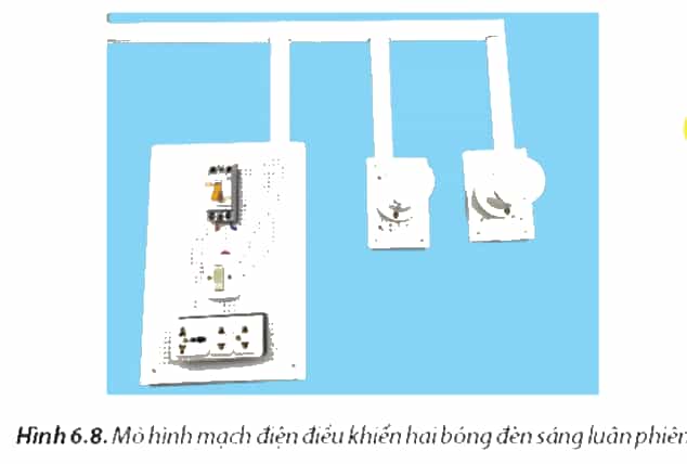 Để lắp đặt được mạch điện điều khiển hai bóng đèn sáng luân phiên như Hình 6.8